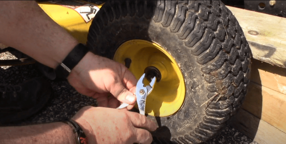 Carefully remove the worn tire