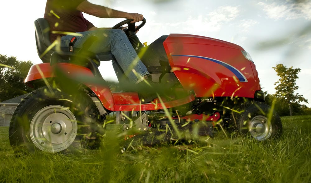 how to use a riding lawn mower on a hill